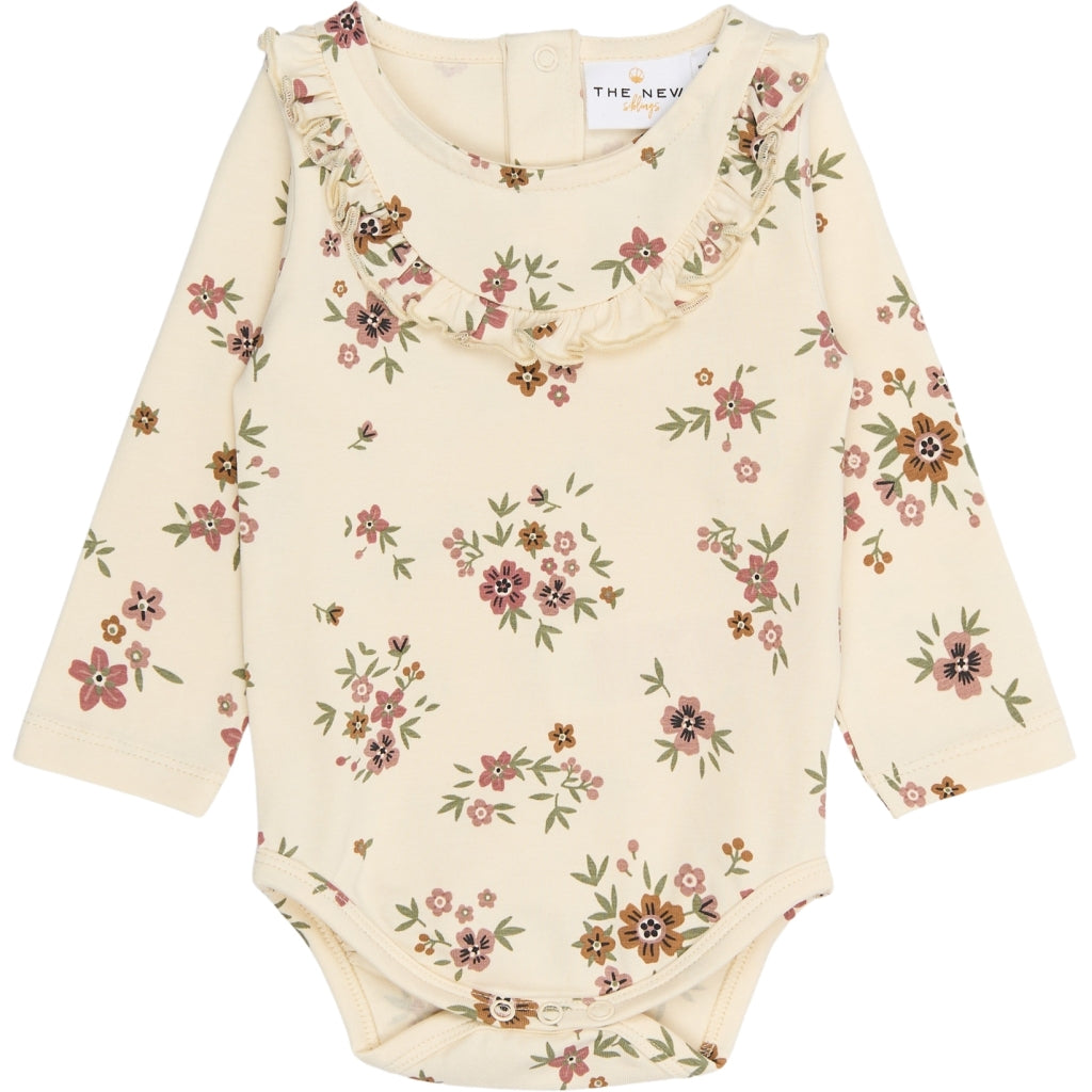 THE NEW - OLYMPIA ROMPER