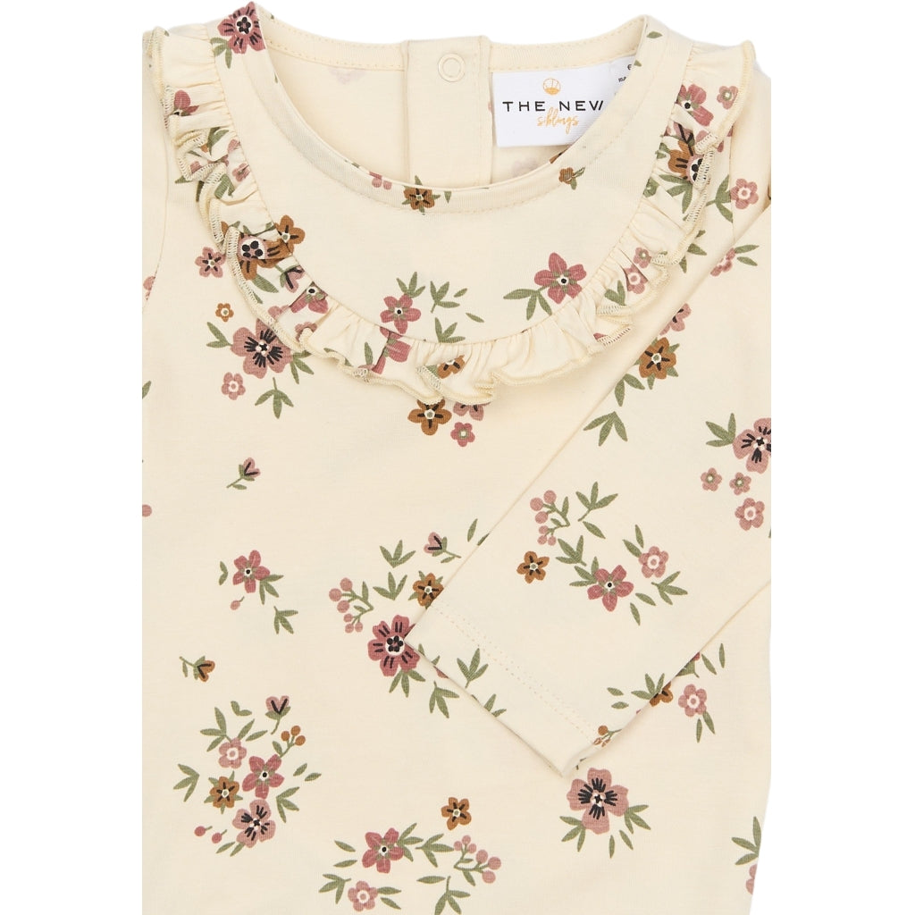 THE NEW - OLYMPIA ROMPER